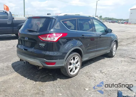 2013 Ford Escape Titanium z USA, uszkodzony, nr VIN 1FMCU0J90DUA13114